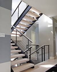 Extensive Modern Staircase With Cable Railing By Stainless Cable Railing Modern Home Interior Desi Interior Stair Railing Modern Stairs Home Stairs Design