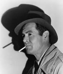 Robert Ryan. Great actor who excelled at playing steel hard tough guys.