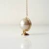Story image for pearl pendant from Designboom