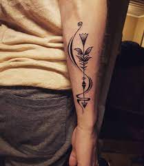 A nature inspired, heaven and earth representation of a birth. Sxetikh Eikona Sagittarius Tattoo Sagittarius Tattoo Designs Arrow Tattoos For Women