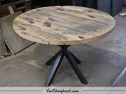 wagondelen tafel rond met een ster frame leuke tafel om met al je gasten rond te zitten sloophout reclaimedwood wagond tafel bankje tafel rond hout tafel
