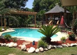 Opposite side we match the veneer stone and. Pin By Kelley Hannan On Beach House Backyard Pool Landscaping Backyard Landscaping Designs Backyard Landscaping