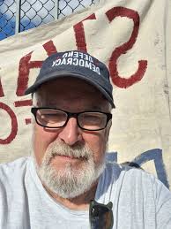 Handmaid protest for democracy at pioneer square first Thursday art walk.