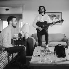 Listen to Simon and Garfunkel