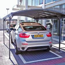 Vitoria 5000 Carport Can Be Easily Installed On A Solid Foundation In This Case A Brick Pavement Outside An Offic Pole Barn House Plans Modern Carport Carport