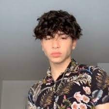 Mariano Castano Is A Tiktok Star Who Rarely Smiles And Always Has A Serious Face In His Vide Boys With Curly Hair Latino Boys Curly Hair Tiktok Boys Curly Hair