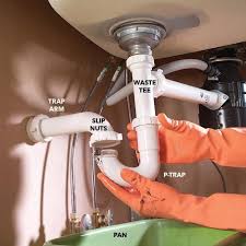 If the pipes under your kitchen sink are exposed, you may not want to fill the gaps around them with spray foam, which isn't the most attractive material in the world. Dewgo8spks520m