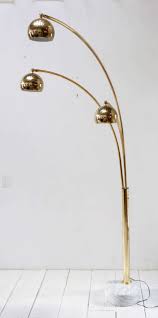 Single light arc floor lamp from the assissi collection features: Vintage Brass And Marble Three Arm Arc Floor Lamp At 1stdibs