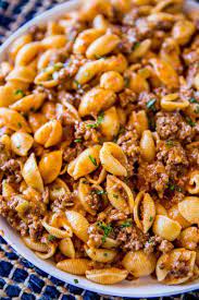 Add pasta, about 3/4 cup of reserved pasta water and parmesan. Cheesy Taco Pasta Dinner Then Dessert