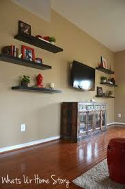 Filling blank and uncertain spaces is among the greatest design challenges — but this sweet setup makes it look easy. Home Tour Whats Ur Home Story Floating Shelves Living Room Home Decor Floating Shelves