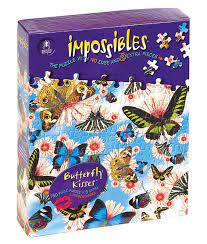 Photo shows my corner and edge pieces separated and sorted into shapes. Impossibles Puzzles Butterfly Kisses 750 Pieces University Games Puzzle Warehouse