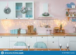 modern white kitchen with pink walls