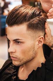 Undercut hairstyles for men are guaranteed to never go out of fashion. Every Man S Favorite Undercut Fade Updates An Old Haircut In Minutes Undercut Fade Hairstyle Mens Hairstyles Undercut Comb Over Haircut