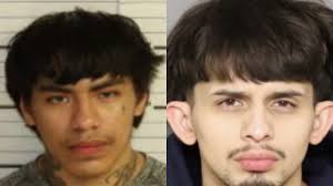 Two men are behind bars, and one is