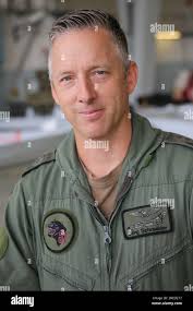 Jagel, Germany. 27th July, 2023. Col. Jörg Schroeder, commander of Tactical  Air Wing 51 "Immelmann," stands in front of a mockup of a Heron 1 drone  during a return roll call in