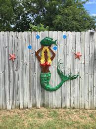 This garden sculpture would be a great gift for a pond owner, garden lover. Painted Mermaid Yard Art For Fence Yard Art Crafts Outdoor Decor