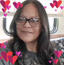 Why is my Siamese cat scratching and covering his food?