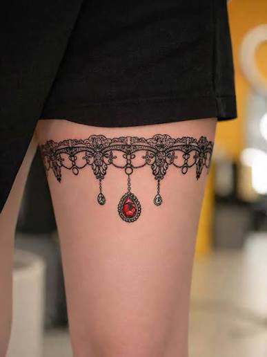 Ornamental lace garter with jewel accents, crafted in fine line and detail.  #ornamentaltattoo #sexytattoos #girltattoos #latattooartist #tattoodesigns