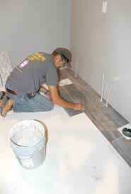 How To Tile A Bathroom Floor With Plank Tiles Tile Floor Diy Plank Tiles Wood Tile Bathroom