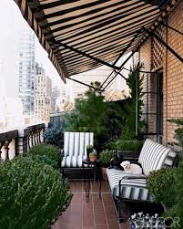 Black And White Striped Outdoor Awnings Buff Brick Topiaries Boxwoods Limestone Balustrade Black And White Striped Awning City Terrace Perfection Balcony Decor Patio Balcony Design