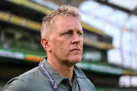 An unwelcome pitch invader is removed