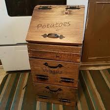 Potatoes and onions both keep the best under similar conditions: Wooden Potato Veggie Onion Bin Vegetable Storage Potato Etsy