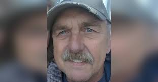 Obituary information for James "Beau" John Kujawa