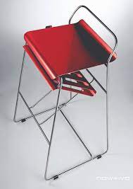 The top and bottom ends of the sling have no pockets and are not secured to the frame. Pocket Chair Carl Liu