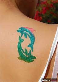 Pin By Jorden Collins On Glitter Tattoos From Sweet Dolphins Tattoo Dolphin Tattoo Design Tattoos