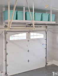 Diy overhead garage storage for $100, easy weekend project. Overhead Garage Storage Diy Garage Storage Ideas Google Search Diy Overhead Garage Revamping Your Garage Space Doesn T Have To Be Costly Dam Caa