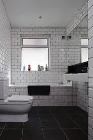 Black And White Bathroom Floor Tiles Uk A Bath In The Uk Spotted On Jj Locations Bathroom Tile Designs White Bathroom Tiles Modern Bathroom Tile