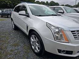 Image result for Silver Topaz 2014 SRX