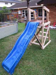 Giant Diy Paddling Pool In Backyard Backyard Slide Pool Slide Diy Diy Slides