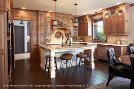 Crafted from a blend of solid and manufactured wood, it showcases two tiers of countertop space for meal prepping or dining. Kitchen Island Vs Breakfast Bar Which Should You Choose