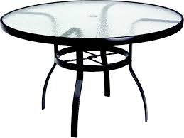 Which brand has the largest assortment of patio tables at the home depot? Woodard Aluminum Deluxe 48 Wide Round Acrylic Top Dining Table With Umbrella Hole Wr822148w