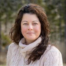 Who can recommend an interior designer for large commercial spaces?