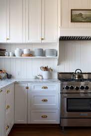 How to makeover a kitchen backsplash with a pressed tin farmhouse style inexpensively and in 6 4. Why We Added A Backsplash To Our Range How The Paneling Is Holding Up The Grit And Polish