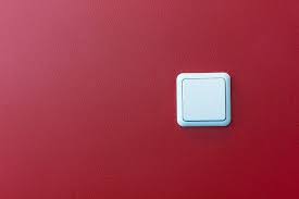 Plastic Light Switch In The Red Wall Photograph By Aleksandr Volkov