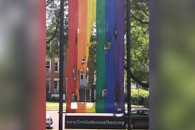 He then returned to the strip club where he used lighter fluid to burn. Albany Damien Center Lgbt Pride Flag Burned