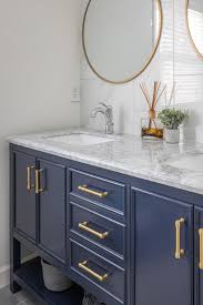 Check spelling or type a new query. Super White Quartzite Countertops Blue Cabinets Porcelain Tile Backsplash Dark Gray Floor In 2021 Blue Cabinets Blue Bathroom Vanity Master Bathroom