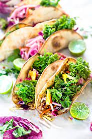 Whisk together the rice wine vinegar, sugar and olive oil. Asian Tilapia And Kale Slaw Tacos