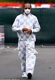 Lewis hamilton rarely appears in black tailoring, instead opting to inject colour into his suiting choices. Lewis Hamilton Embodies Racing Spirit In Chequered Flag Inspired Outfit At Emilia Romagna Grand Prix Aktuelle Boulevard Nachrichten Und Fotogalerien Zu Stars Sternchen