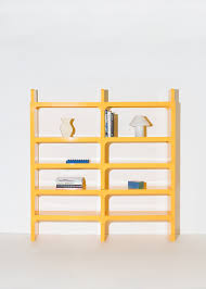 Since the apartement is on the top floor, the ceiling is angular and the bookshelf had to be fitted to. Modular Shelf By Olaf Von Bohr For Kartell Bi Rite Studio