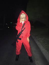 This money heist costume is a complete head to foot costume including the red jumpsuit, dali mask, and a pair of white gloves. Pin On Halloween Themes