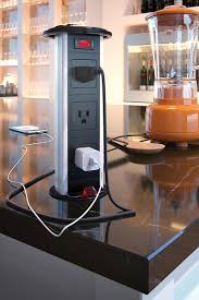 Recessed power outlets and surface mount power and data grommets are a clean and simple way to provide convenient power outlets on your desk for access at the surface level. Kitchen Power Grommet Countertop Outlets Tamper Resistant Countertops Kitchen Remodel Countertops Kitchen Design