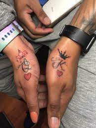 Matching couple tattoos are awesome to strengthen a bond between two individuals, mostly because they are kind of being forced to be together even more after getting some permanent inking. King And Queen Couple Tattoo Couple Matching Tattoo Romantic Couples Tattoos Matching Tattoo