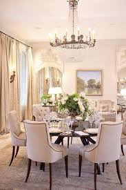 Dining Room With Round Table And Tufted Dining Chairs Round Dining Room Luxury Dining Room Round Dining Room Table