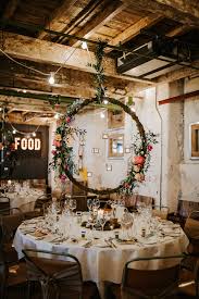 Holmes Mill Wedding Lancashire Industrial Style With Spectacular Florals Feathers In 2020 Industrial Wedding Wedding Table Decorations Cheap Wedding Flowers