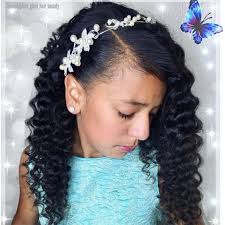 This curly natural hairstyle leaves hair loose while framing your little girl's face perfectly. 15 Cute Curly Hairstyles For Kids Naturallycurly Com