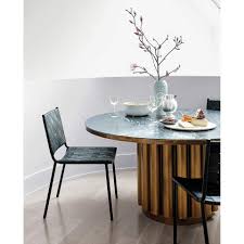 The dining table will take your dining room from drab to fab! Cypher Black Marble Dining Table Cb2 Uae